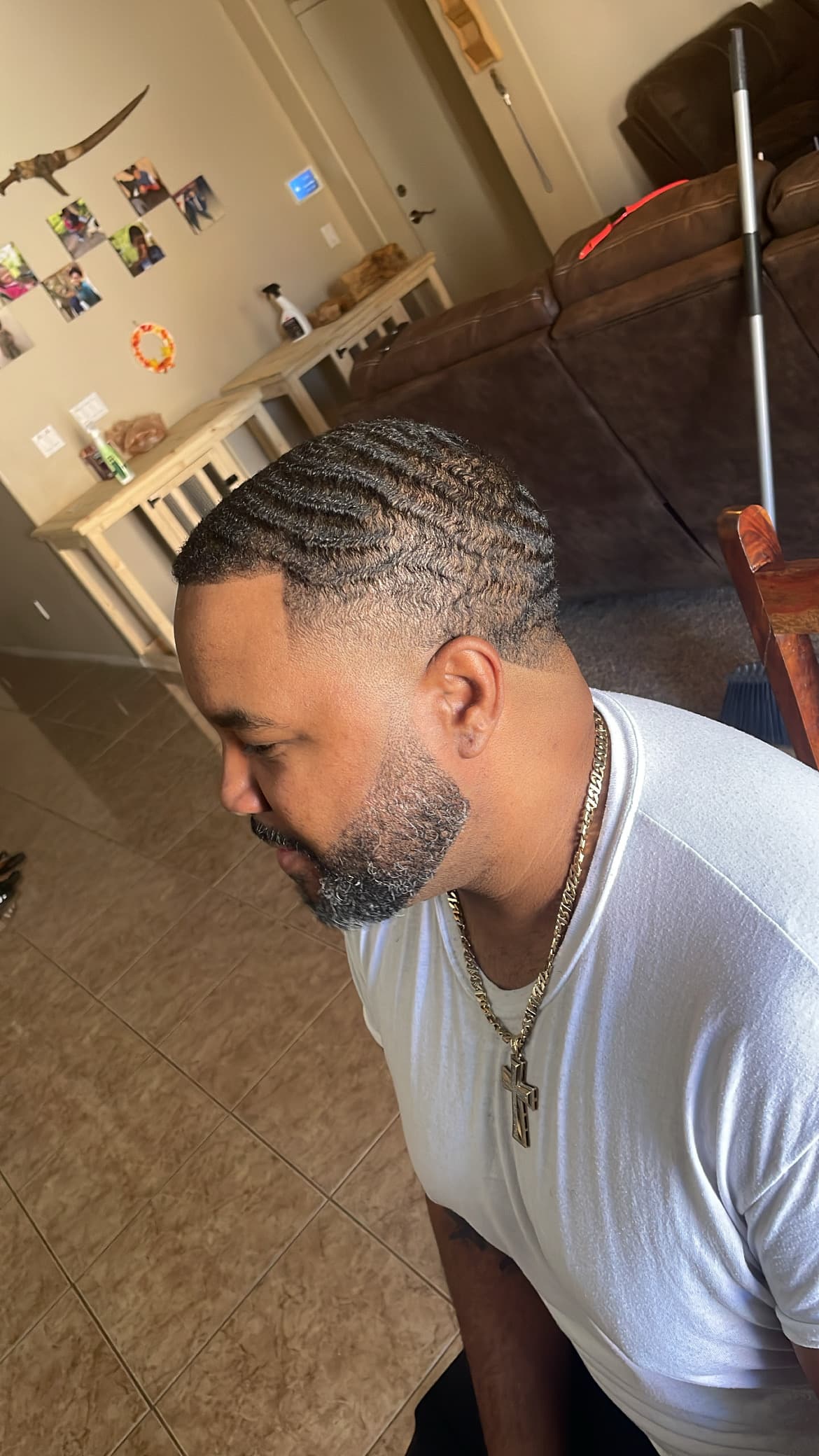 Wave haircut with fade and shaped beard by Buck Xperience